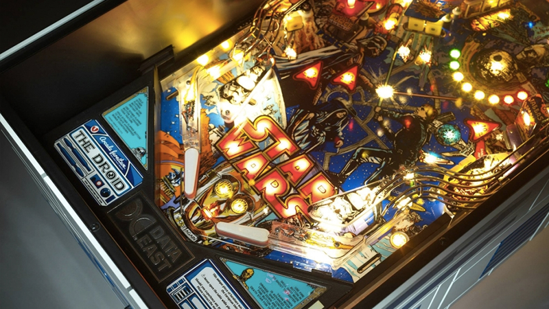 Illustration for article titled All Your Home Really Needs Is This R2-D2 Pinball Machine Coffee Table